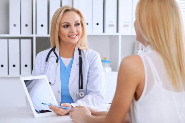 Doctor consulting with patient
