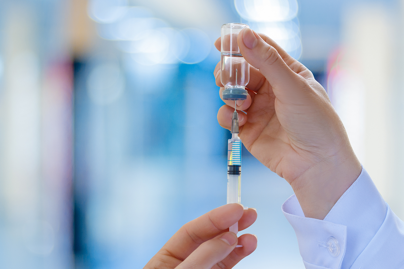 Medical professional preparing medication